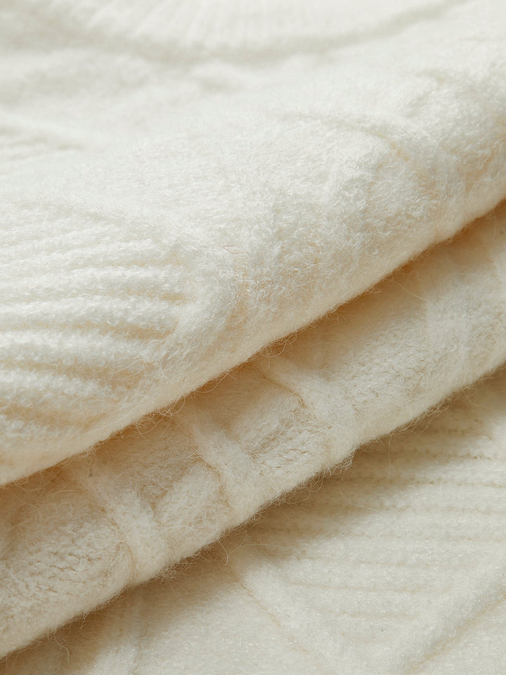 Pull en tricot torsadé à col rond