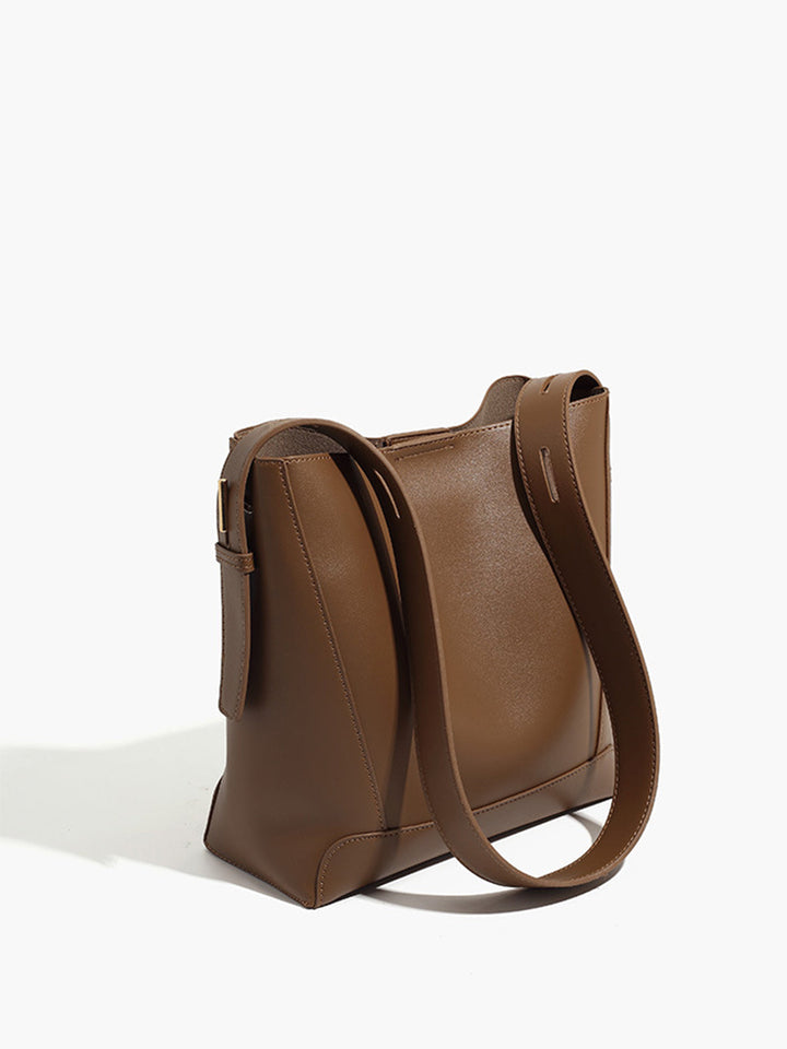 Sac seau passepoilé à boucle souple