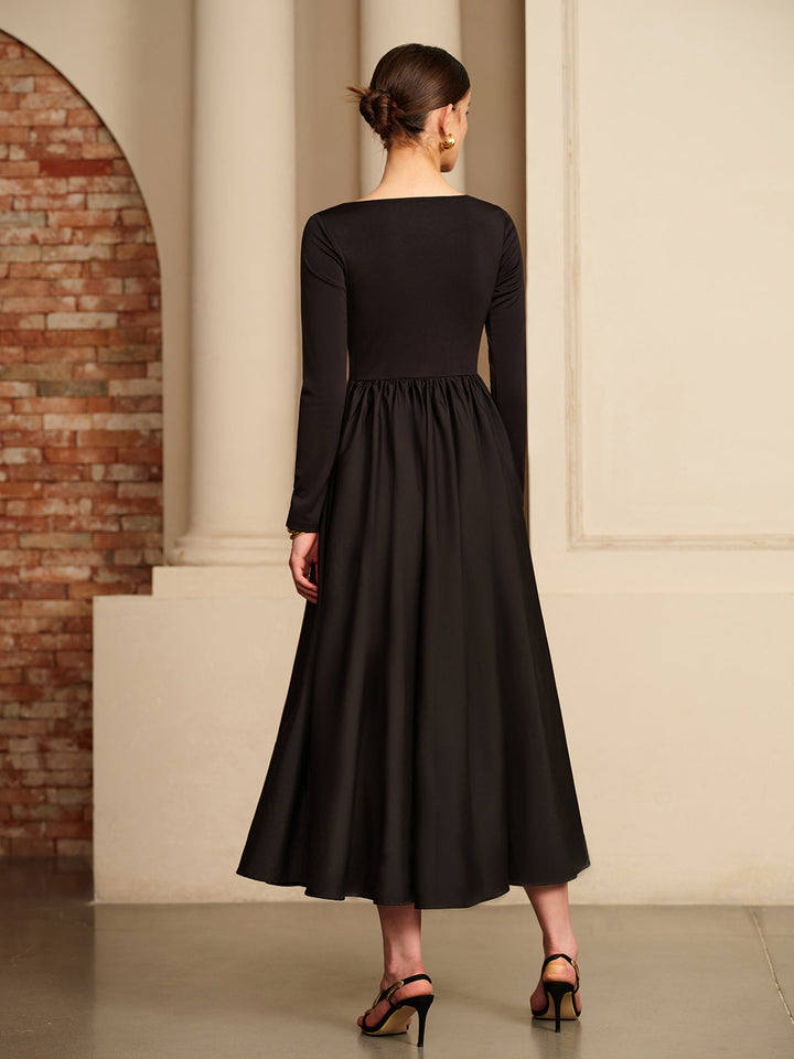 Robe à découpes avec panneaux plissés