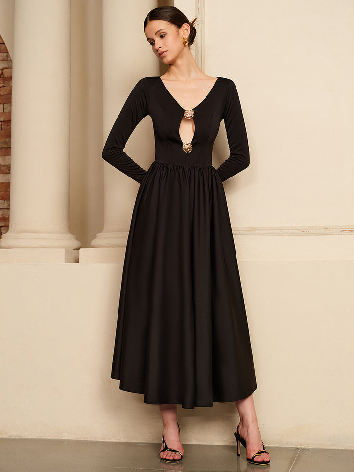 Robe à découpes avec panneaux plissés