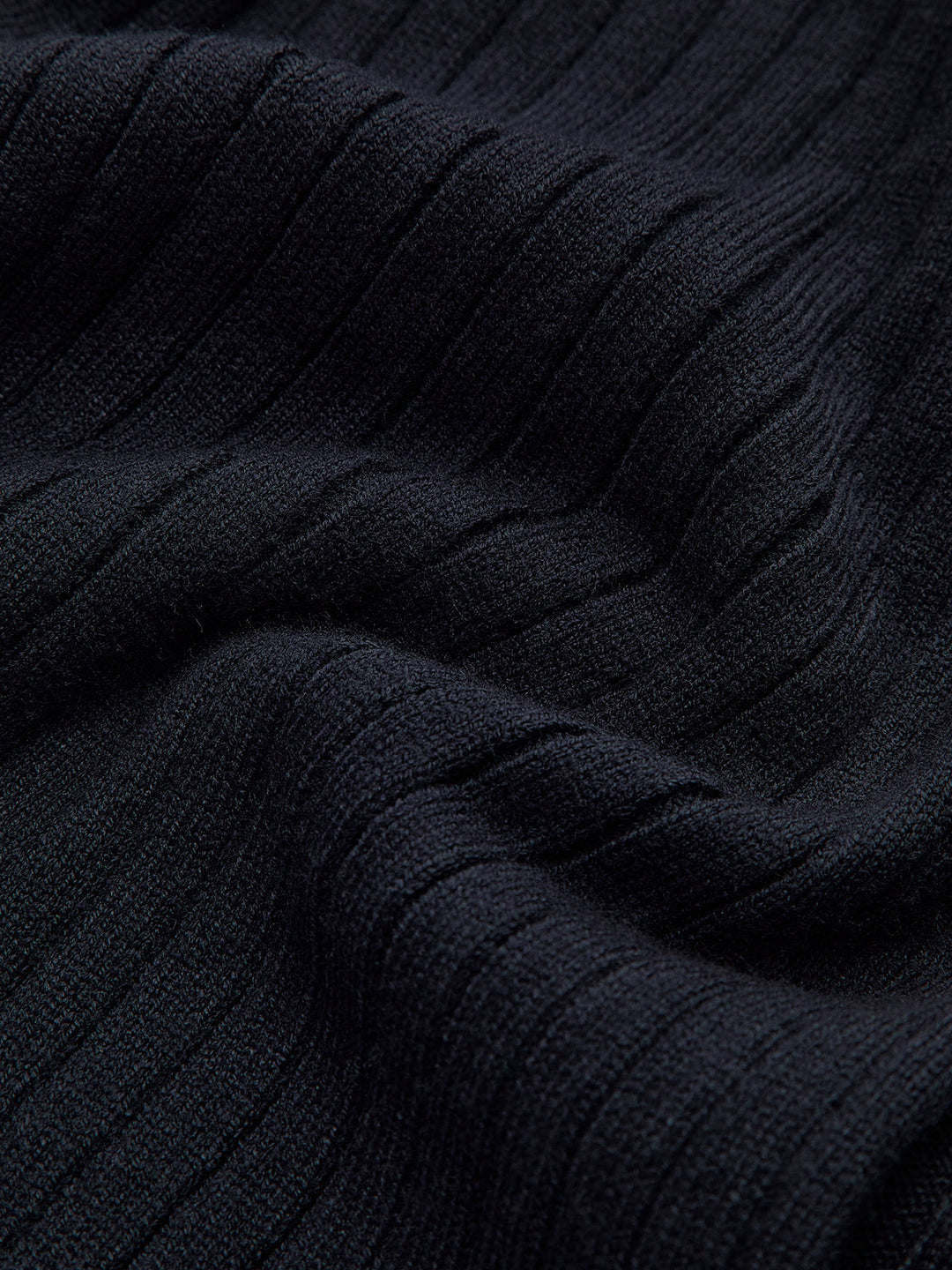 Haut en tricot fendu à boutons dorés
