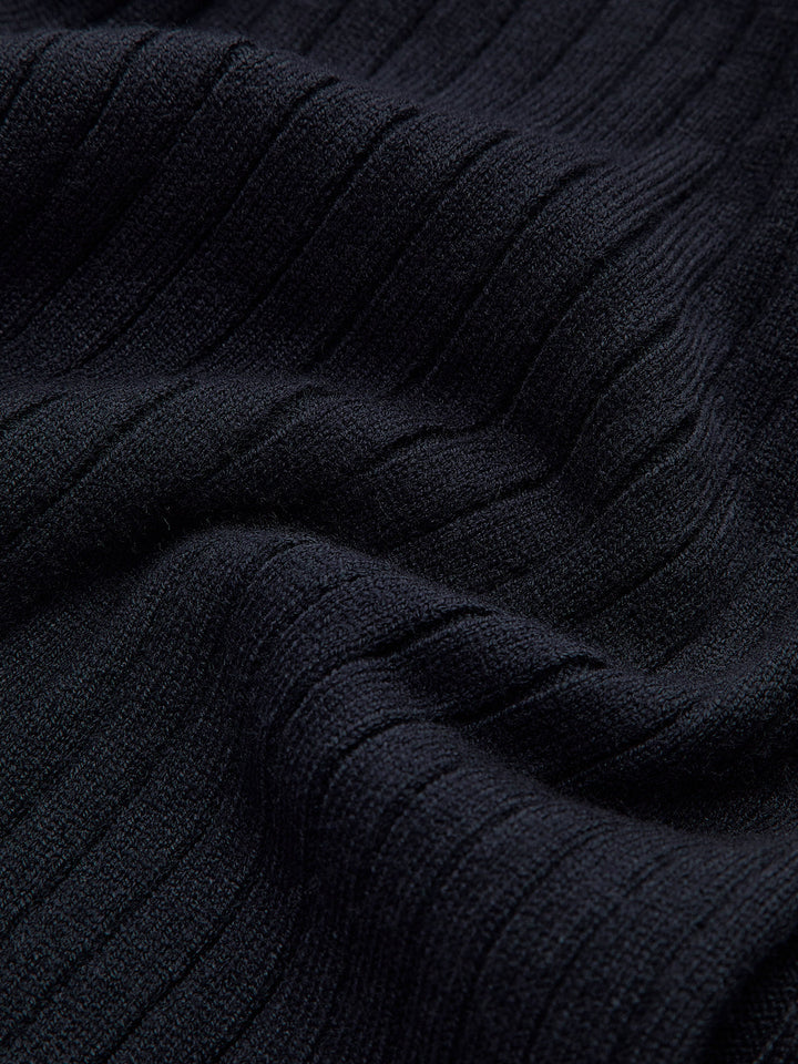 Haut en tricot fendu à boutons dorés