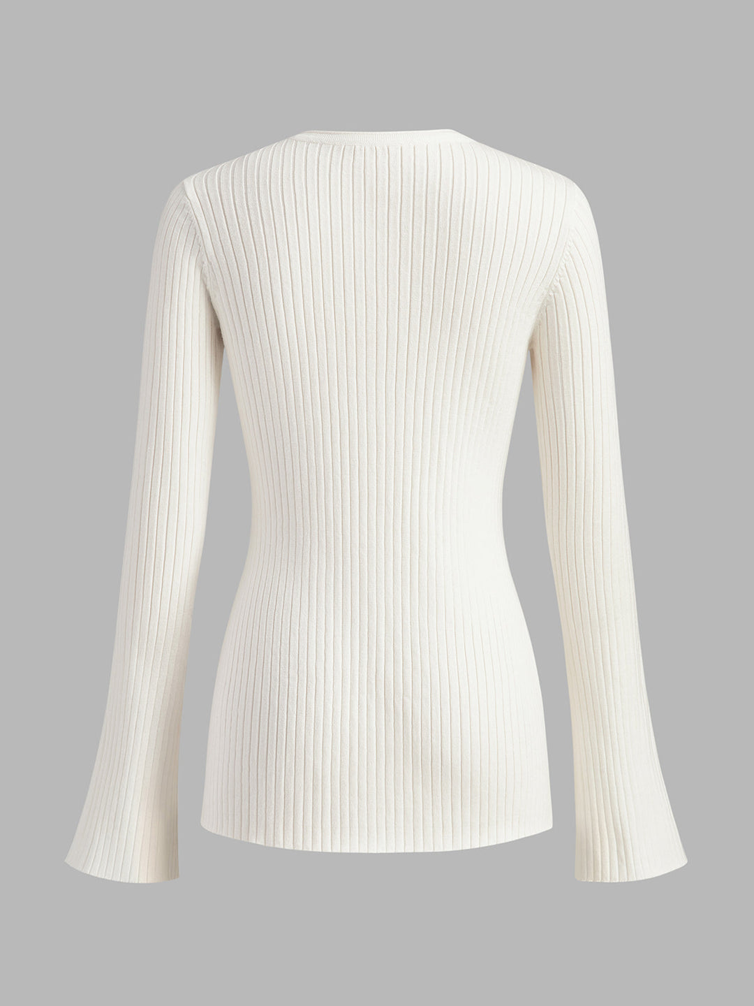 Haut en tricot fendu à boutons dorés