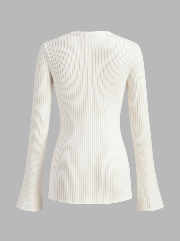 Haut en tricot fendu à boutons dorés