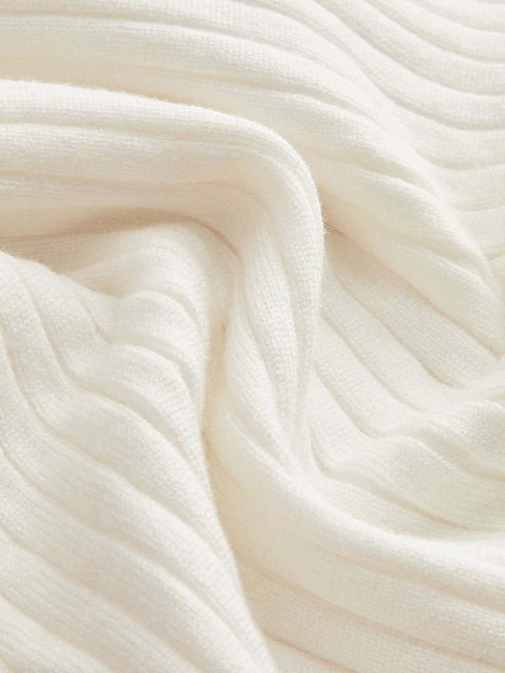 Haut en tricot fendu à boutons dorés