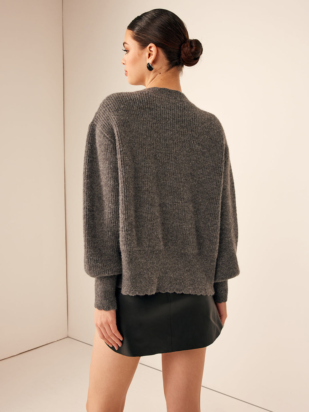 Cardigan à encolure arrondie avec finition ondulée