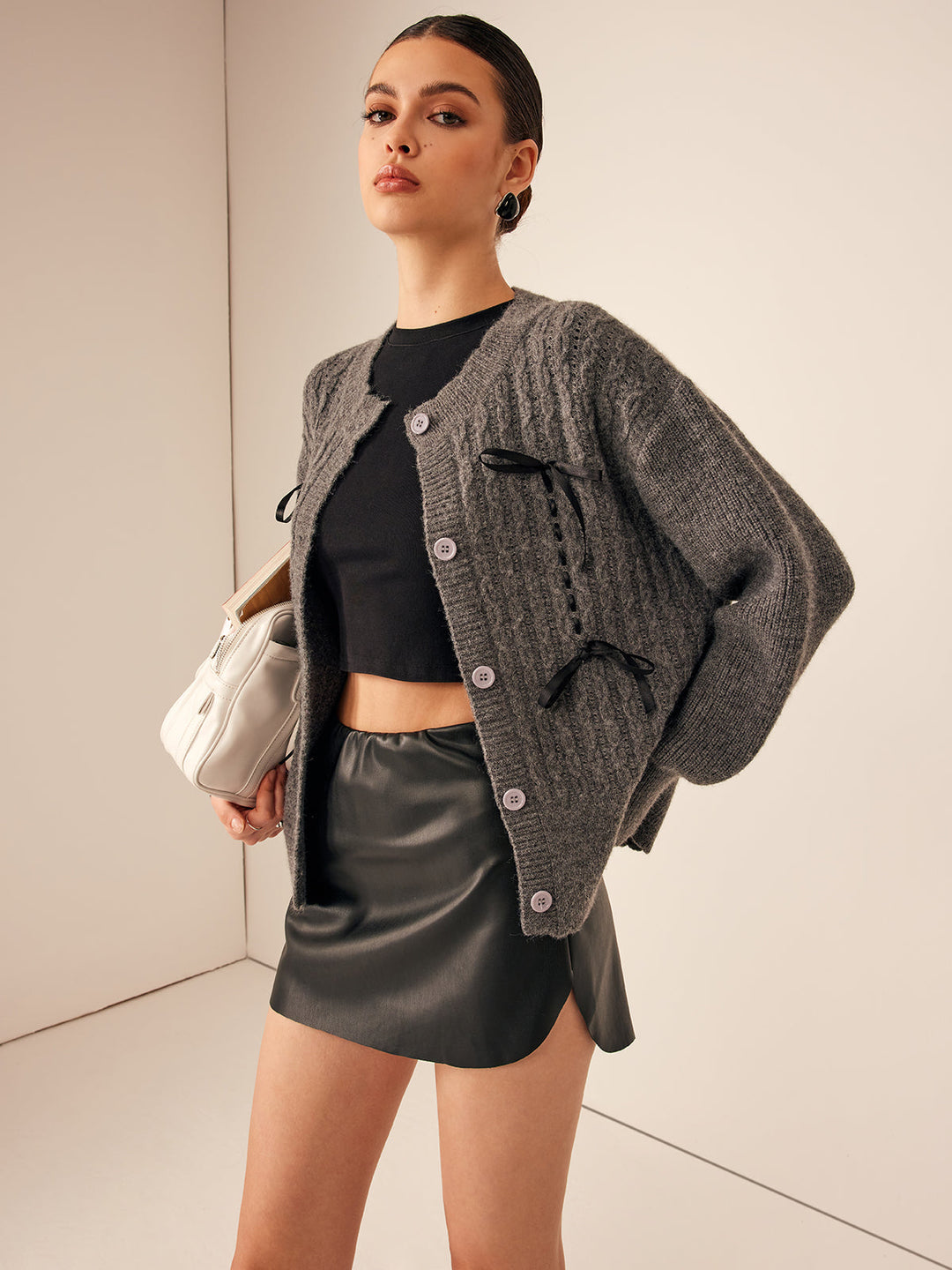 Cardigan à encolure arrondie avec finition ondulée