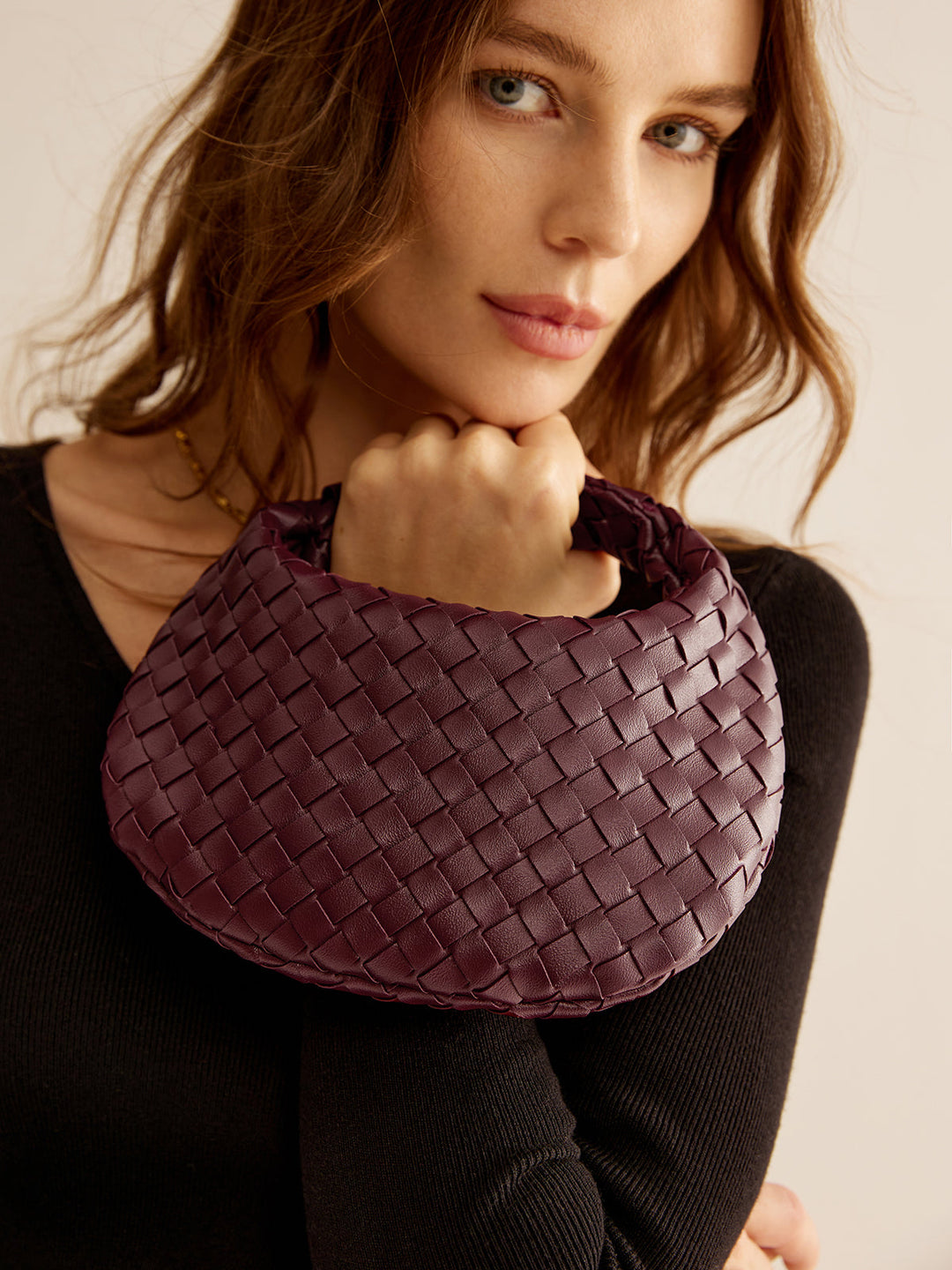 Sac à main zippé tissé arrondi