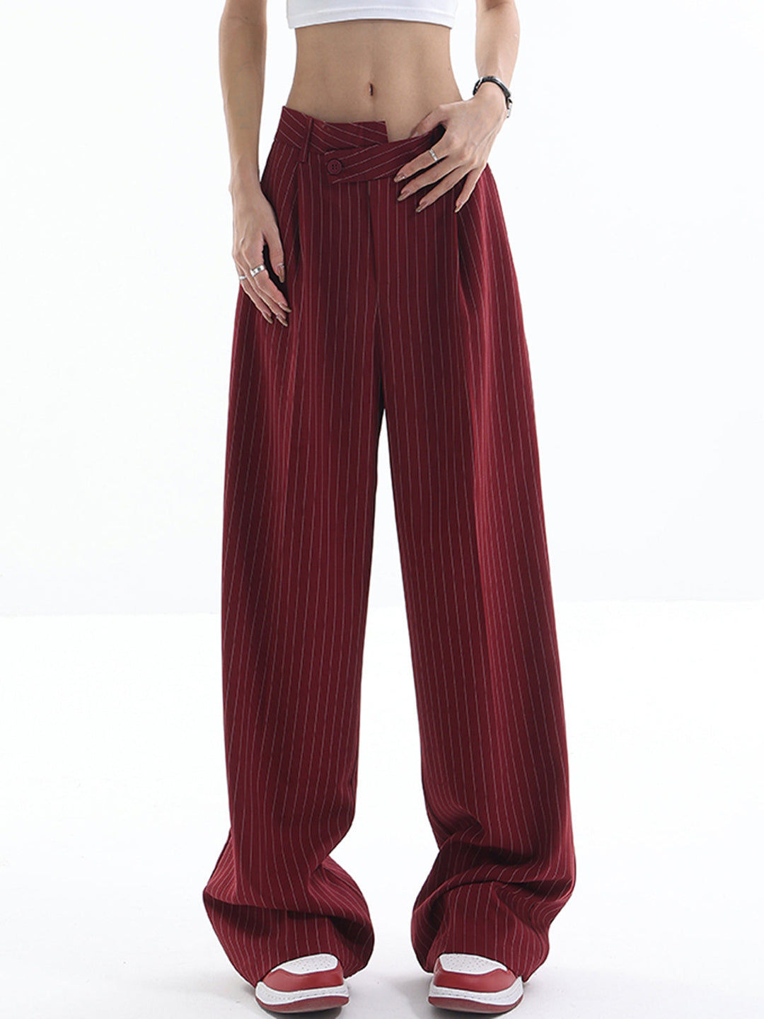 Pantalon à rayures asymétriques taille haute