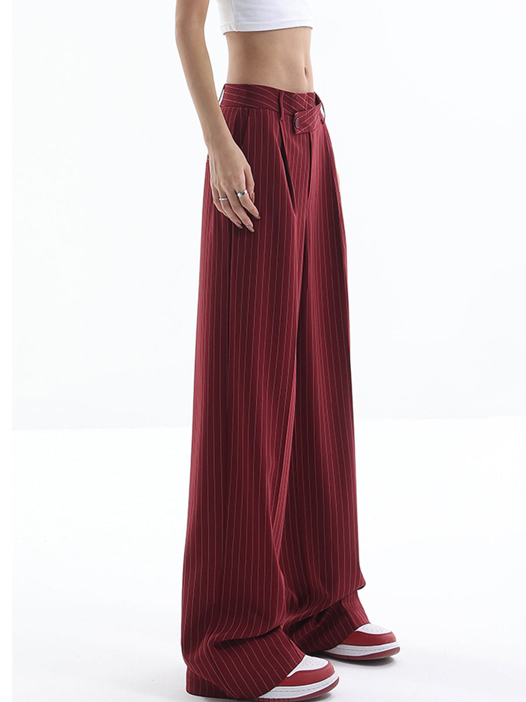 Pantalon à rayures asymétriques taille haute