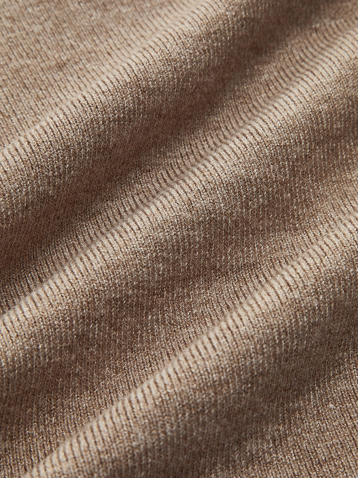 Haut en tricot à col montant à manches longues et patchwork asymétrique