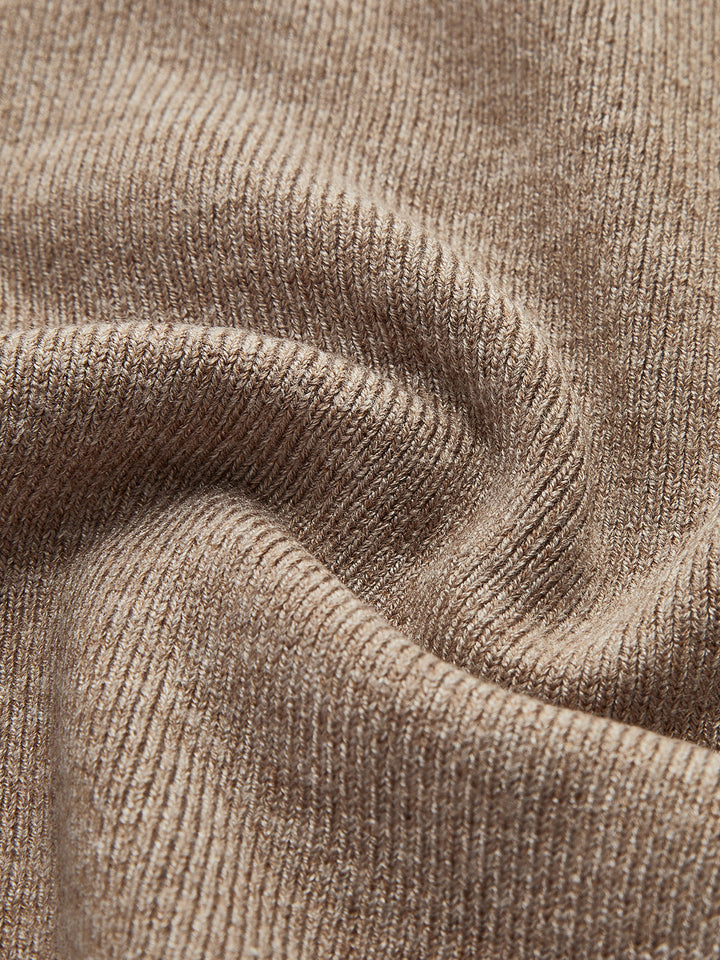Haut en tricot à col montant à manches longues et patchwork asymétrique