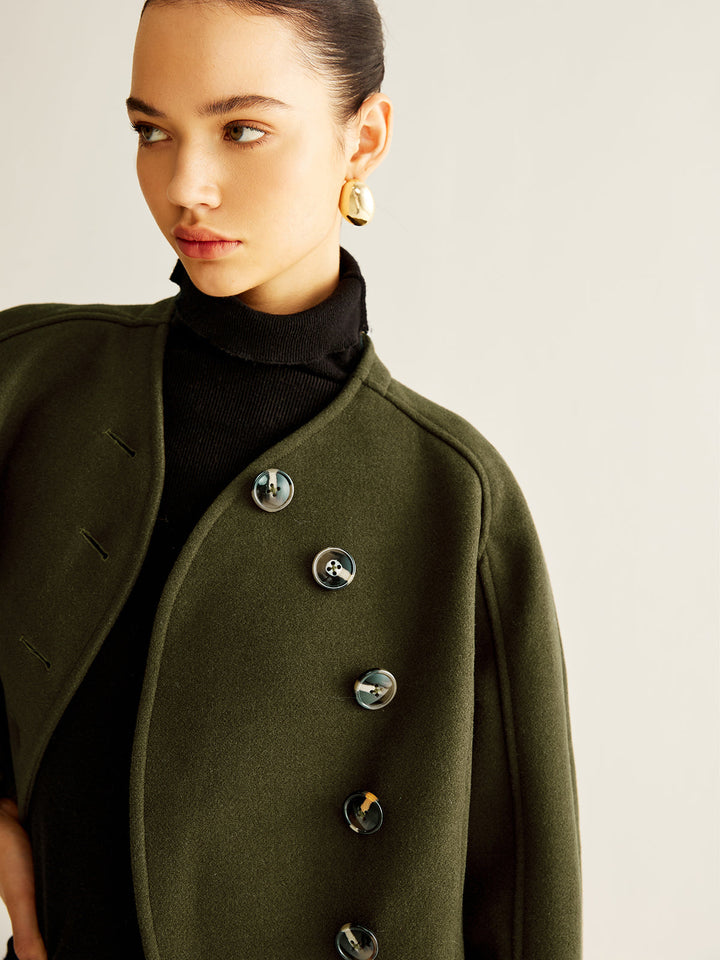 Manteau court asymétrique boutonné en tweed