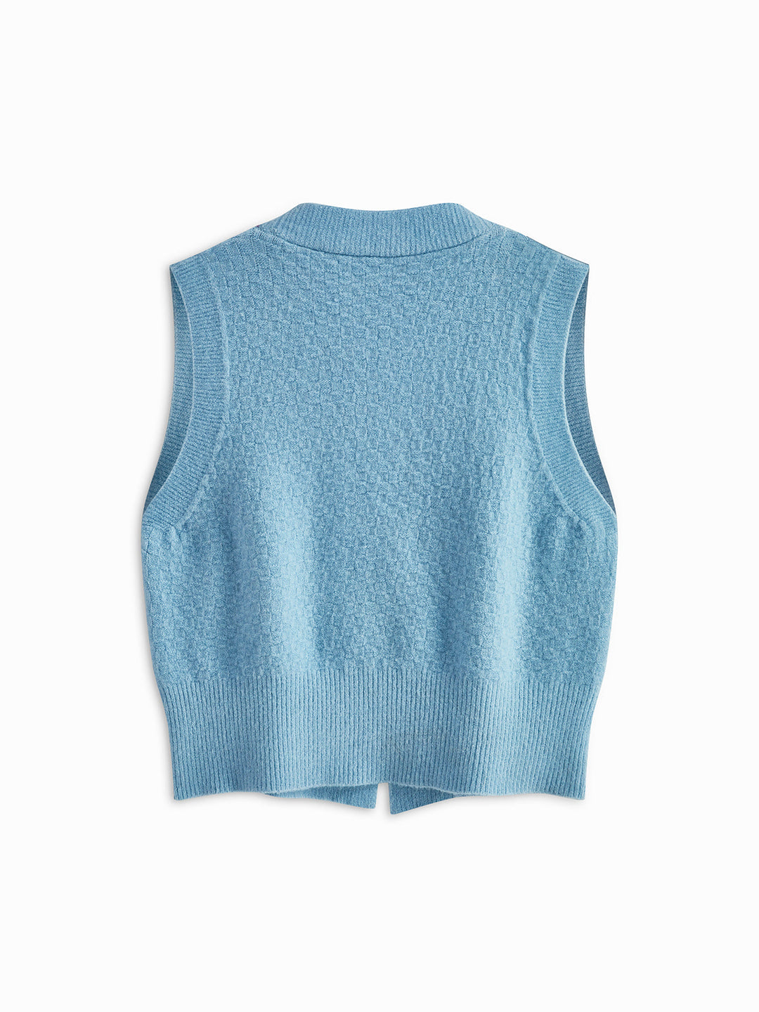 Gilet en tricot torsadé orné de perles