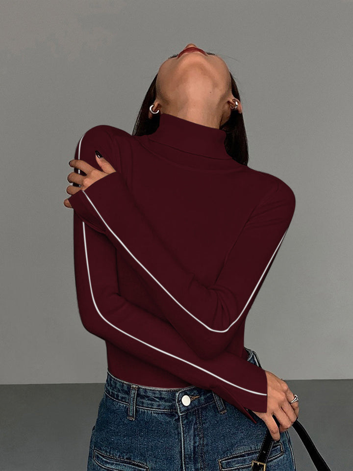 Pull en tricot à col roulé avec passepoil contrastant