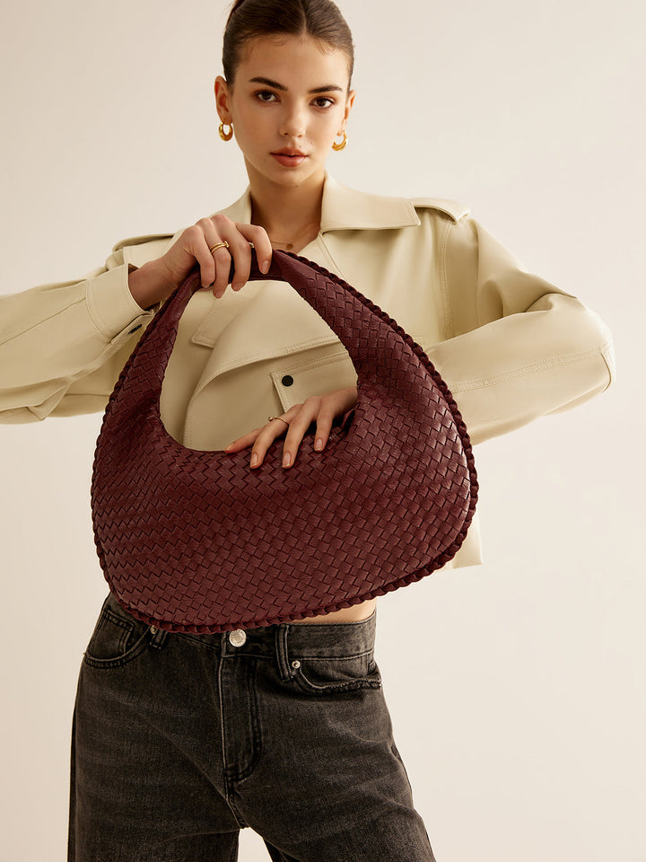 Sac à main zippé tissé rond