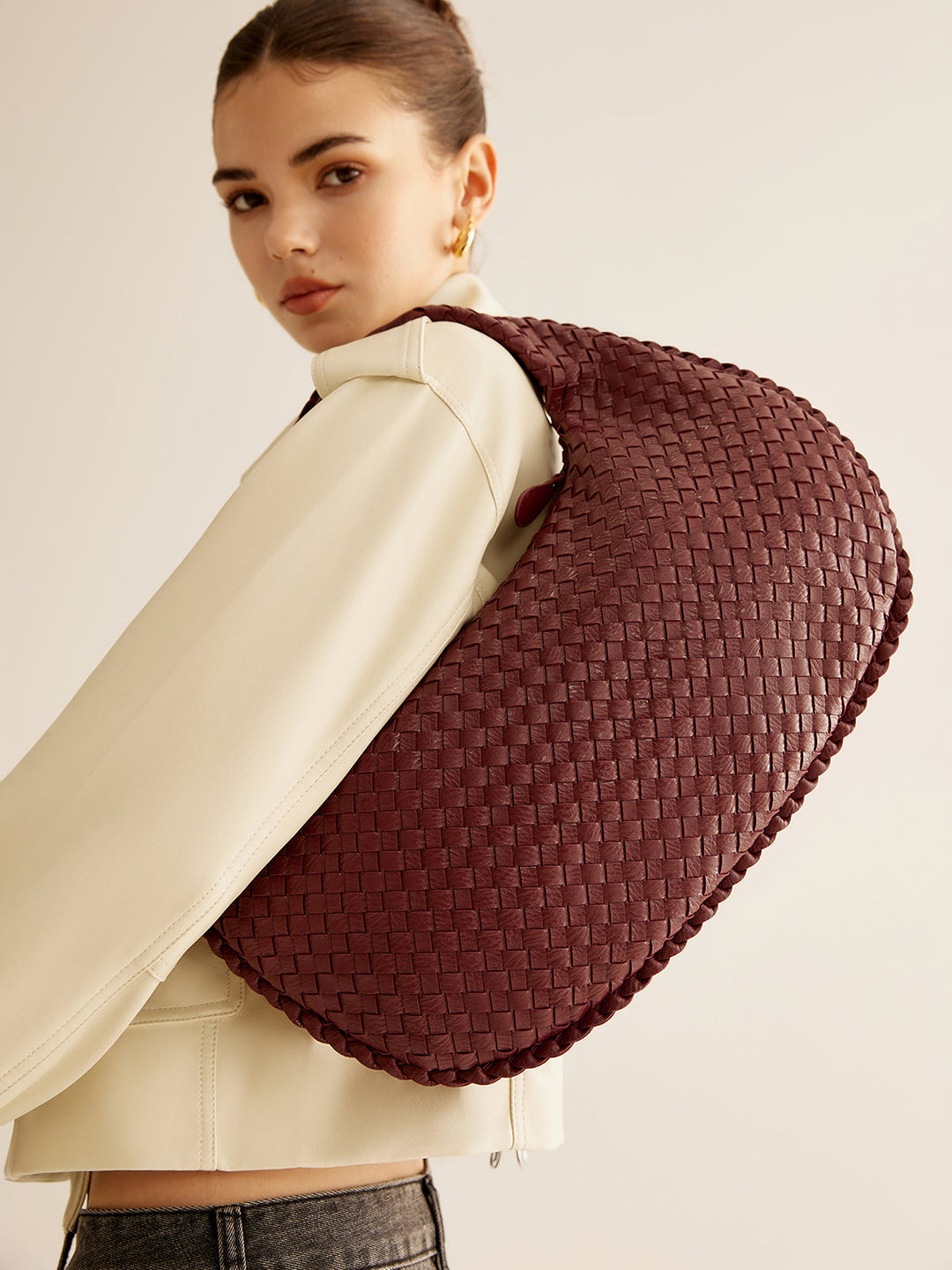 Sac à main zippé tissé rond