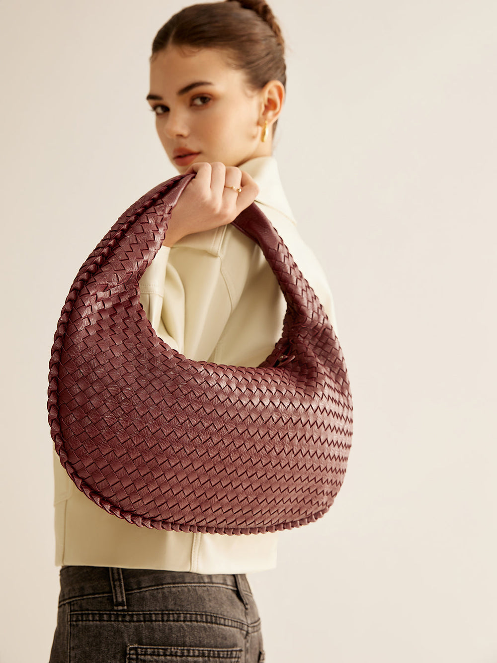 Sac à main zippé tissé rond