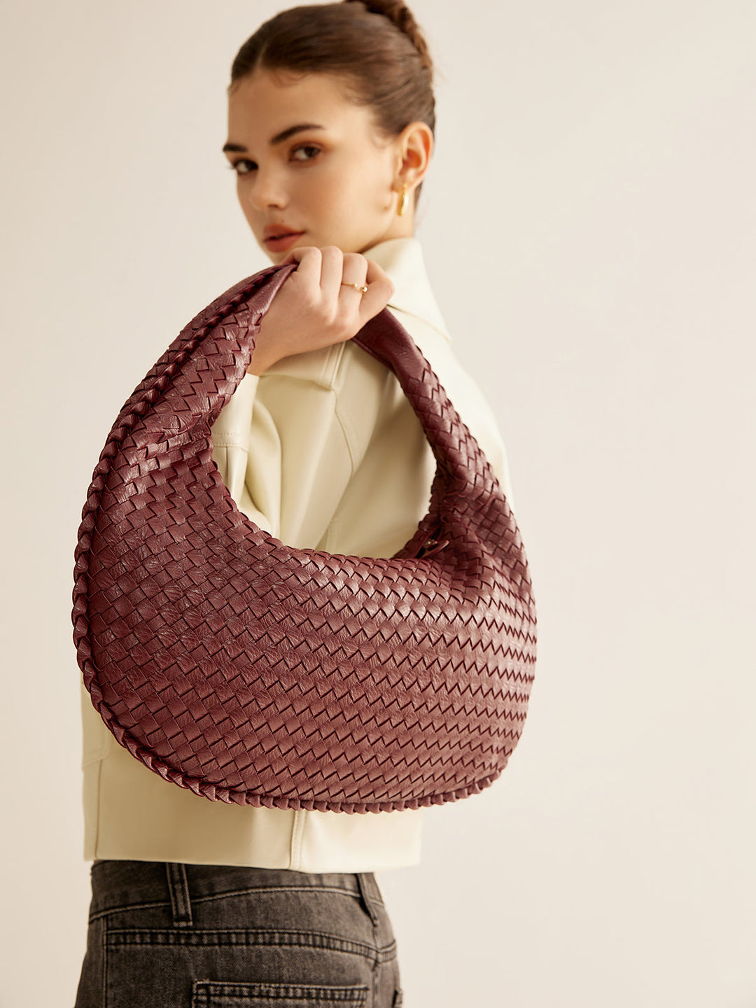 Sac à main zippé tissé rond