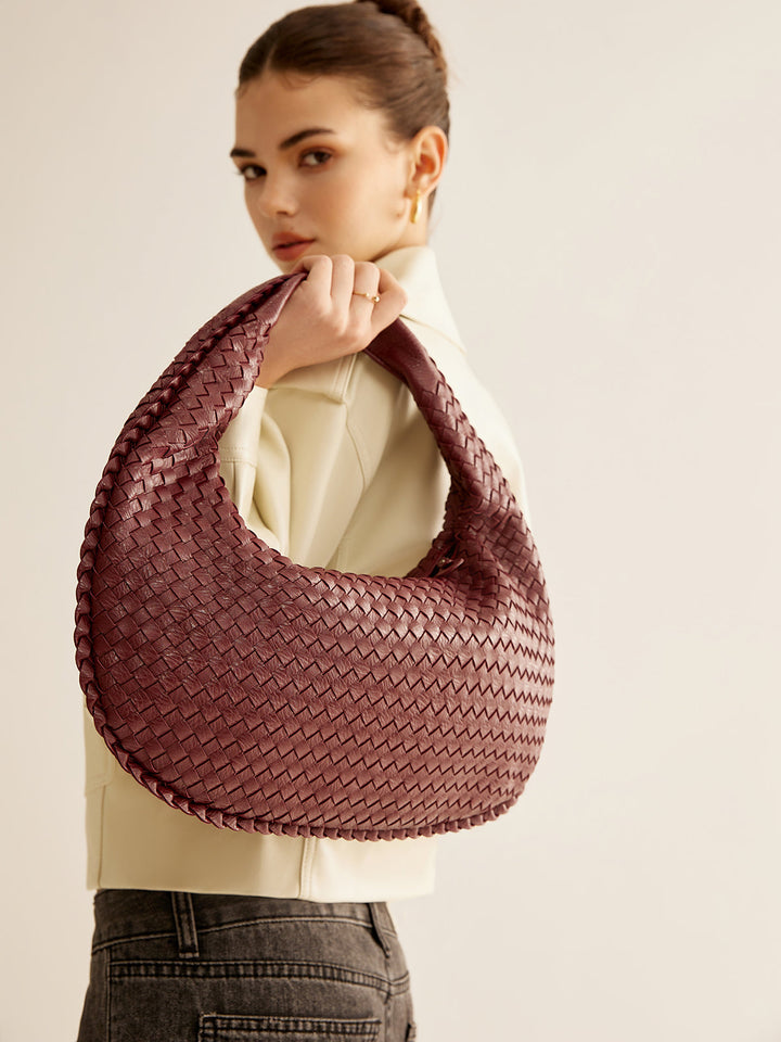 Sac à main zippé tissé rond