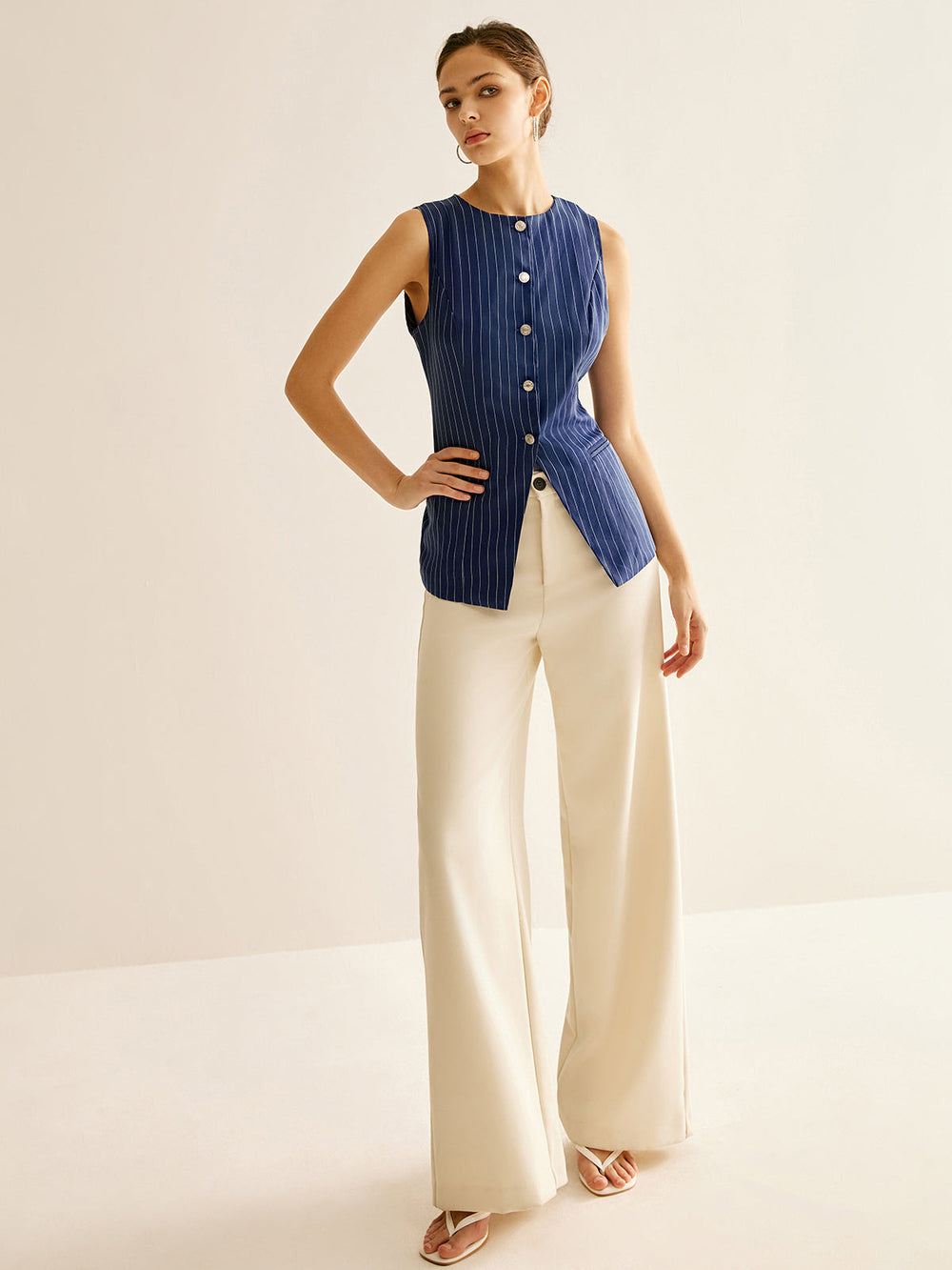 Chemise sans manches à rayures boutonnée