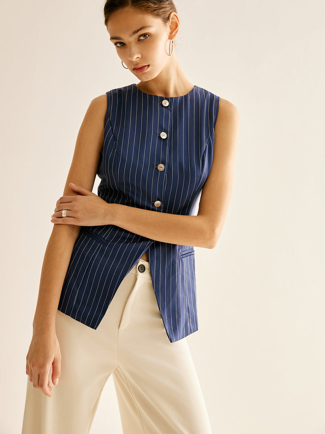 Chemise sans manches à rayures boutonnée