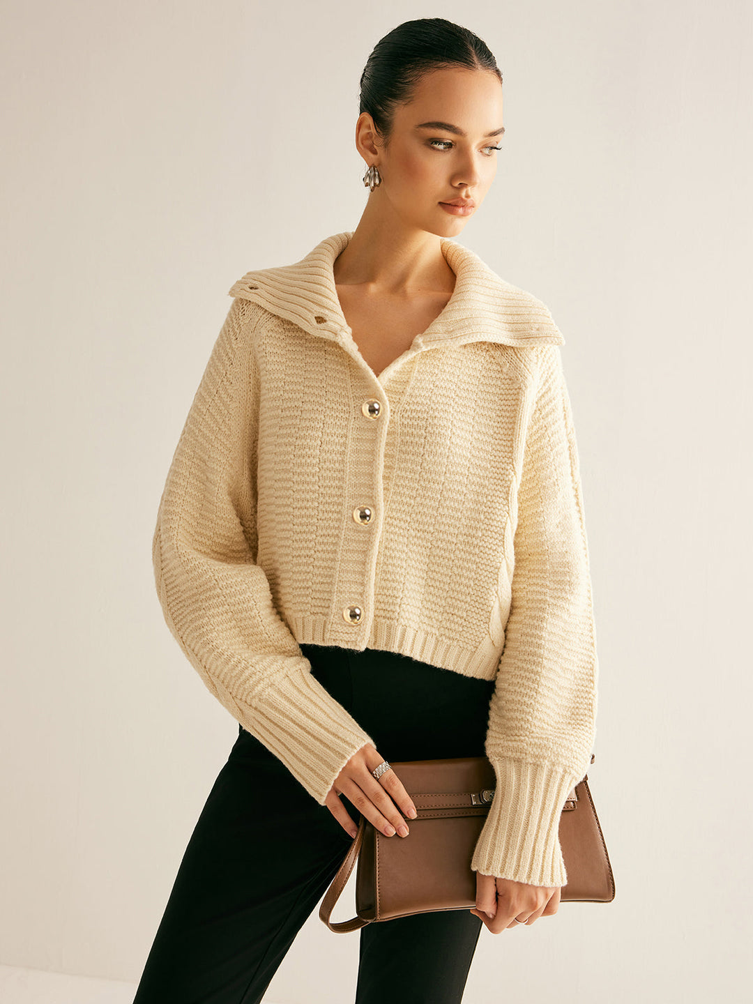 Cardigan en maille torsadée à revers