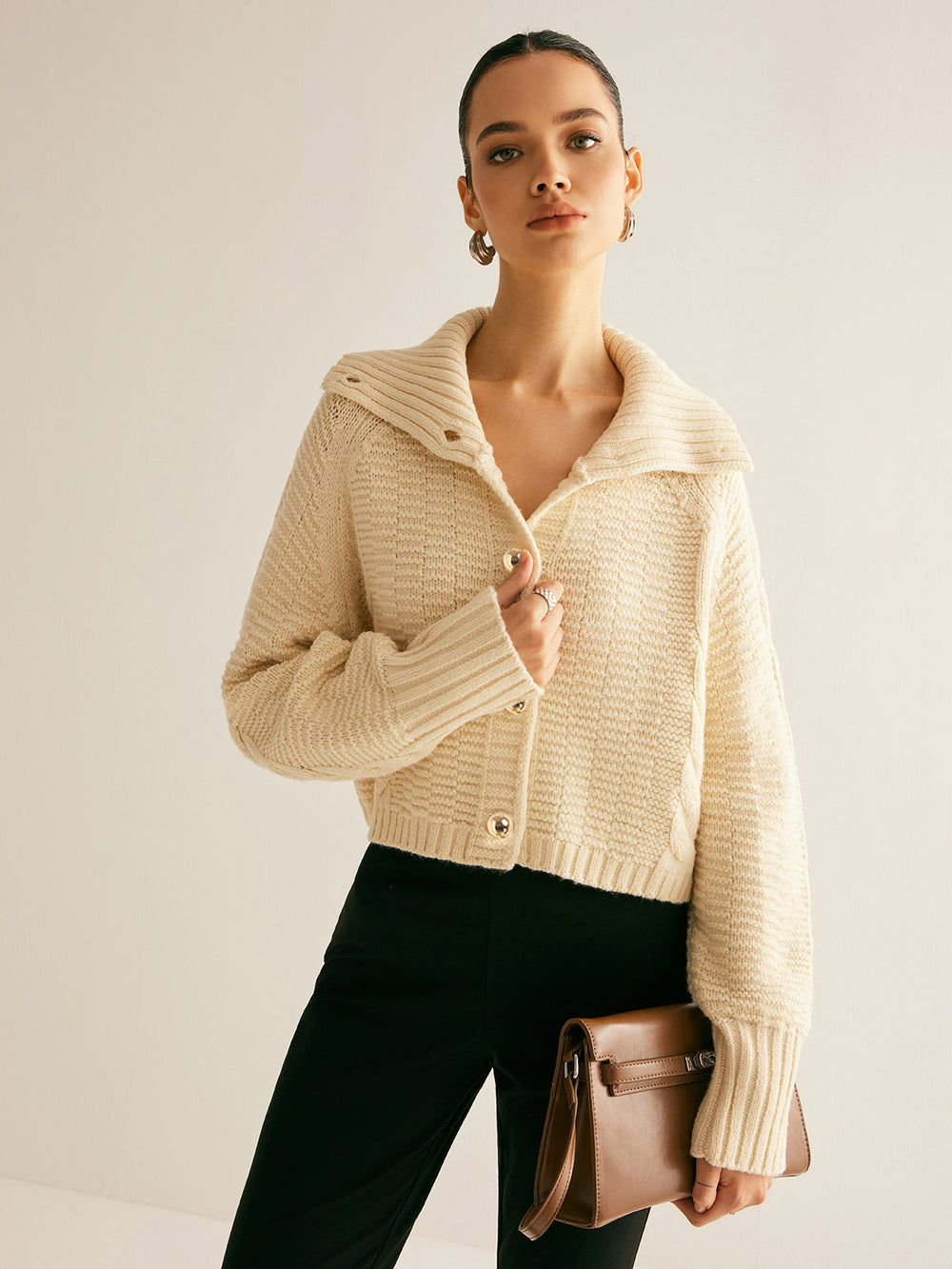 Cardigan en maille torsadée à revers