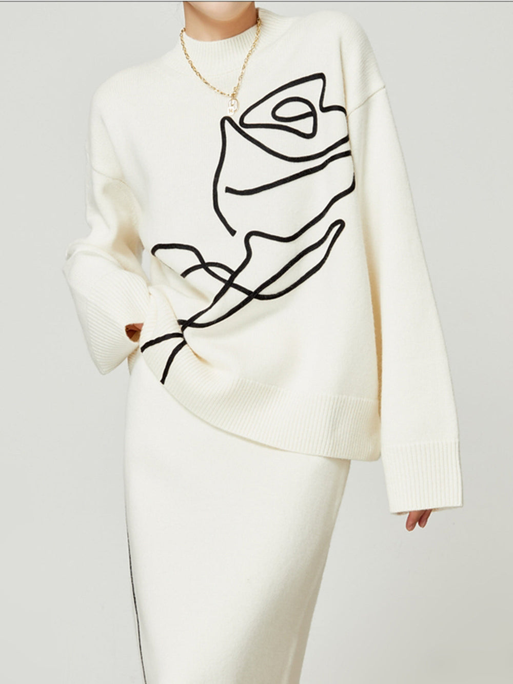 Pull en tricot à fleurs