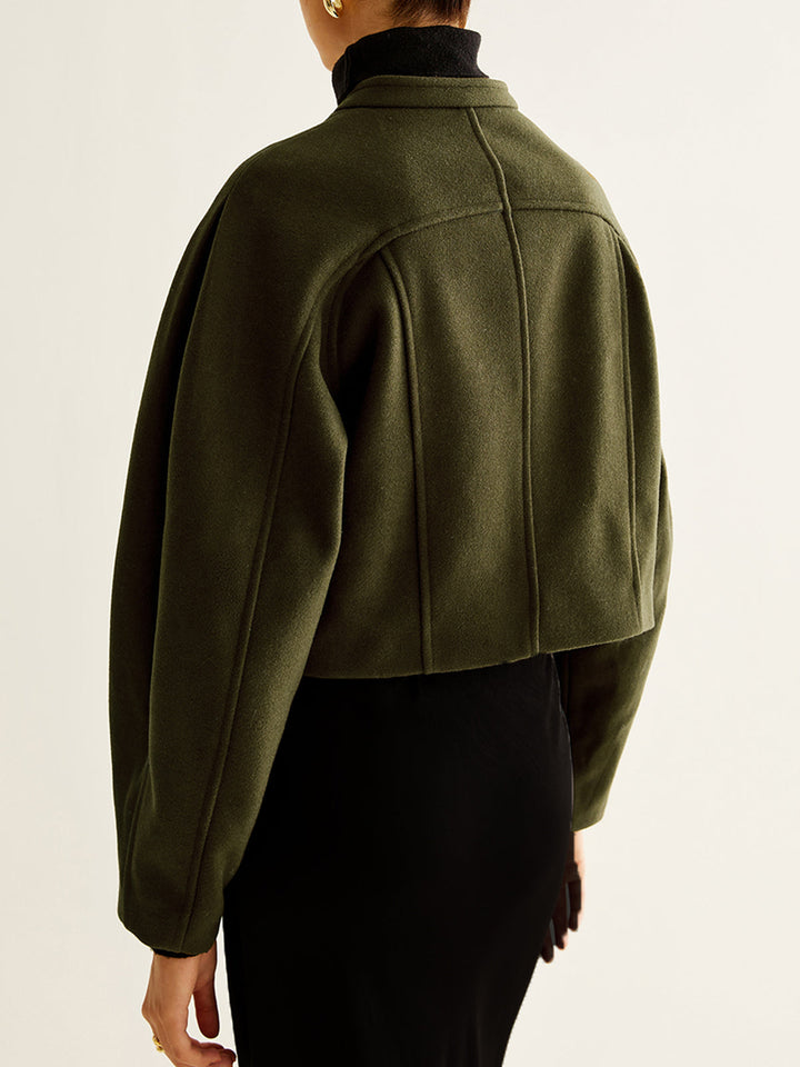 Manteau court asymétrique boutonné en tweed