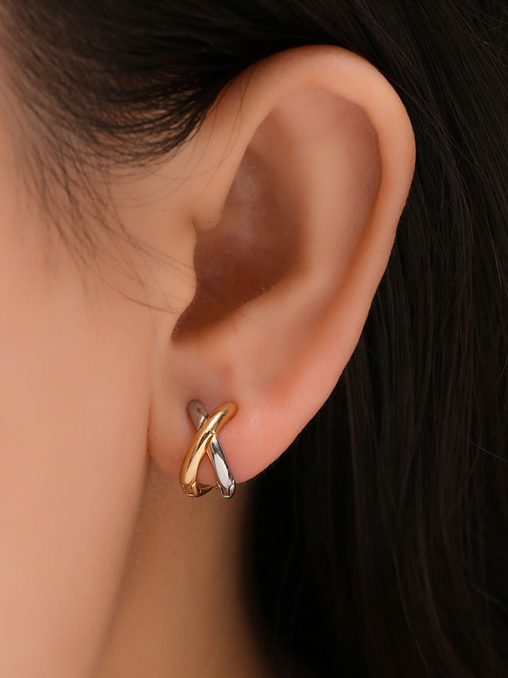Bouton d'oreille bicolore en croix