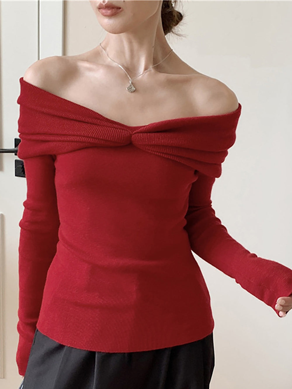 Haut en tricot noué et froncé mélangé à de la laine