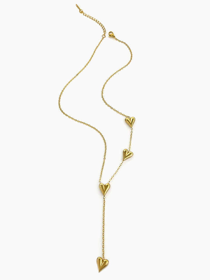 Collier à pompon en forme de cœur doré