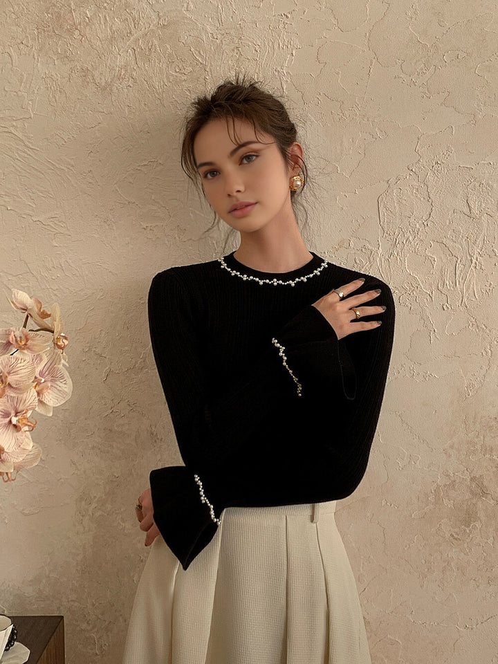 Haut en tricot à volants et perles