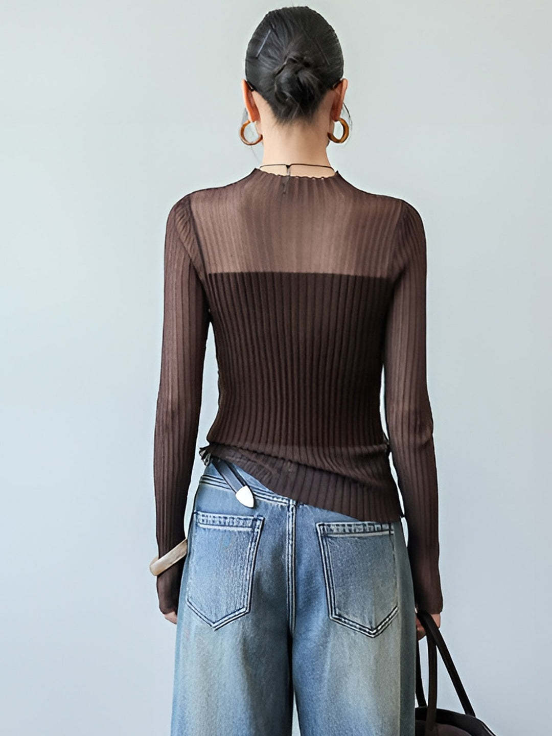 Pull à col roulé ajusté avec empiècements transparents