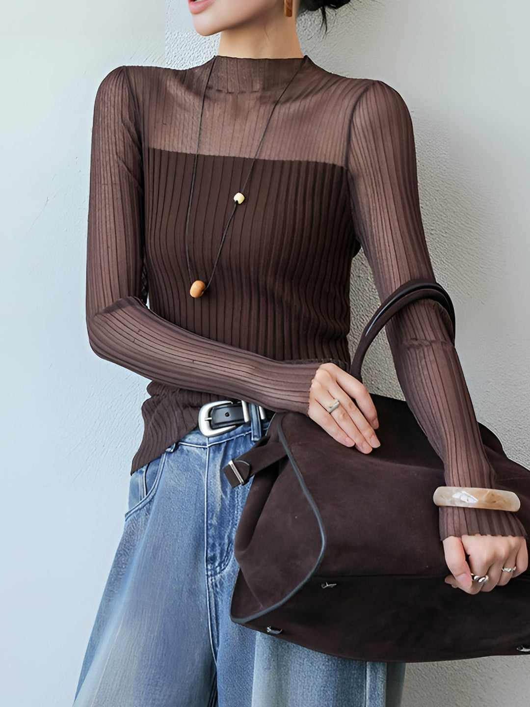 Pull à col roulé ajusté avec empiècements transparents