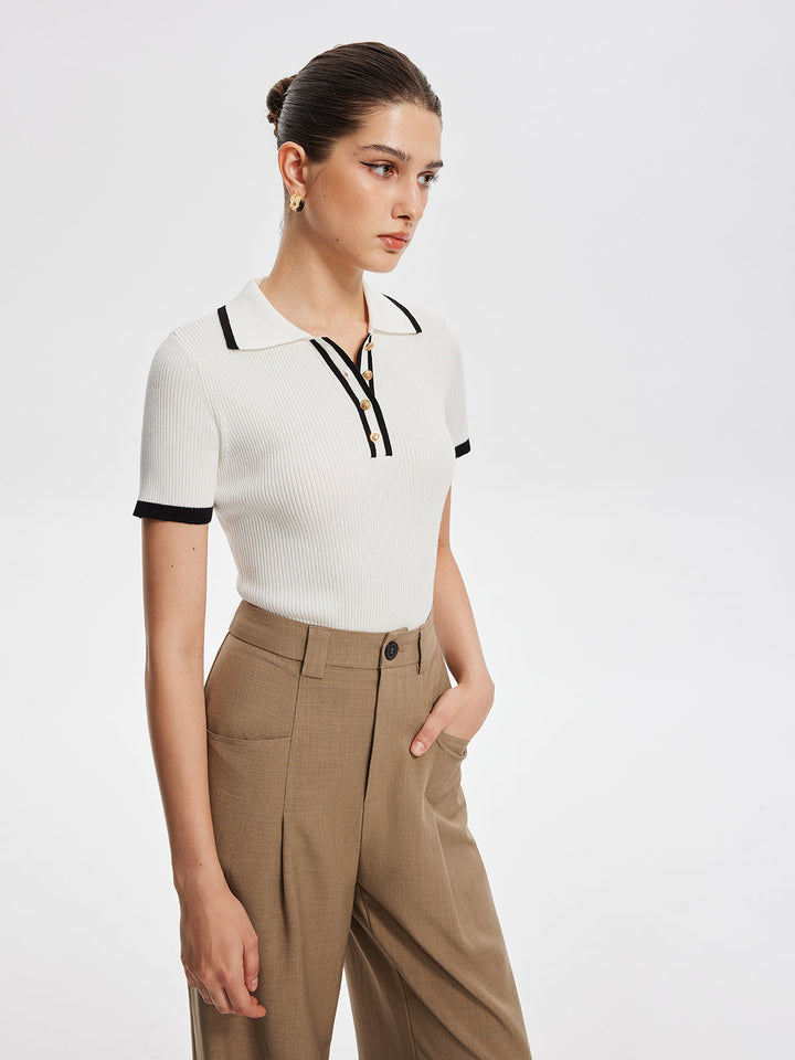 Haut en tricot avec bordure contrastante et boutons en métal