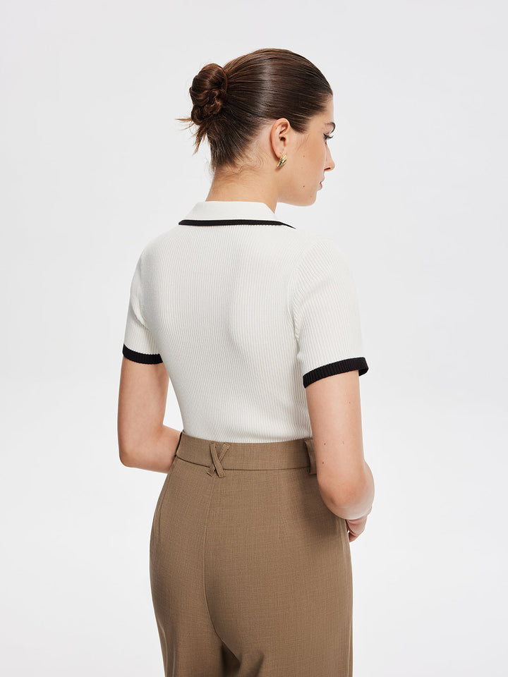Haut en tricot avec bordure contrastante et boutons en métal