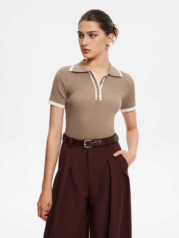 Haut en tricot avec bordure contrastante et boutons en métal