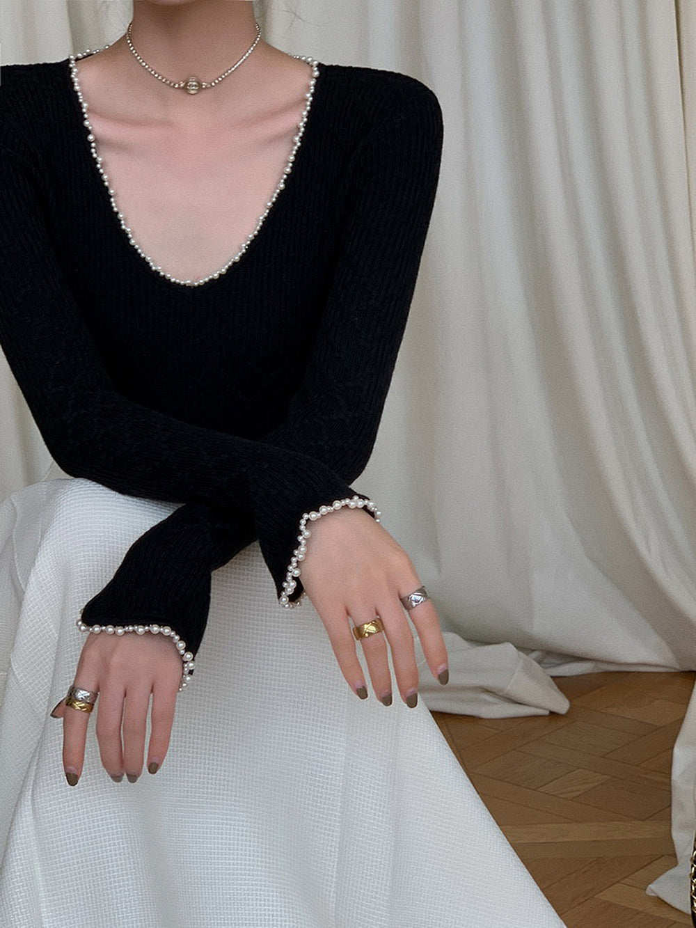 Haut en tricot avec perles en V