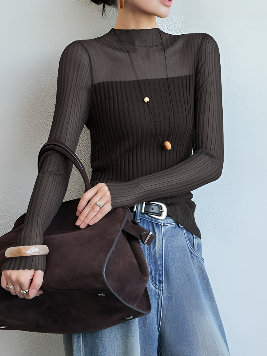 Pull à col roulé ajusté avec empiècements transparents