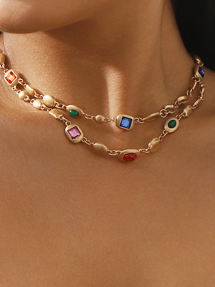 Collier à double rangée de perles colorées