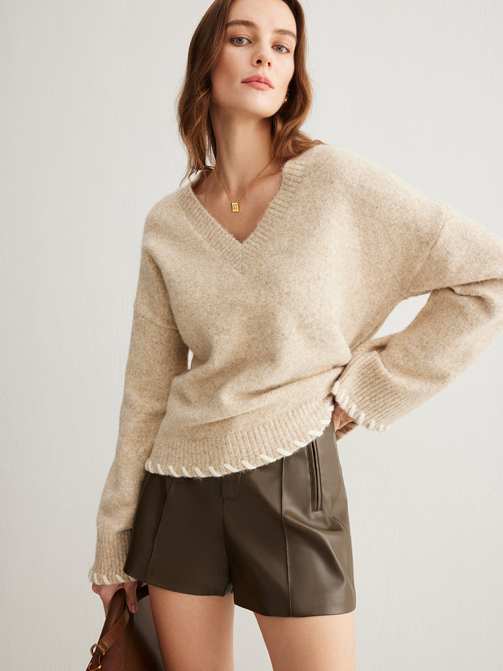 Pull en maille avec bordure brodée
