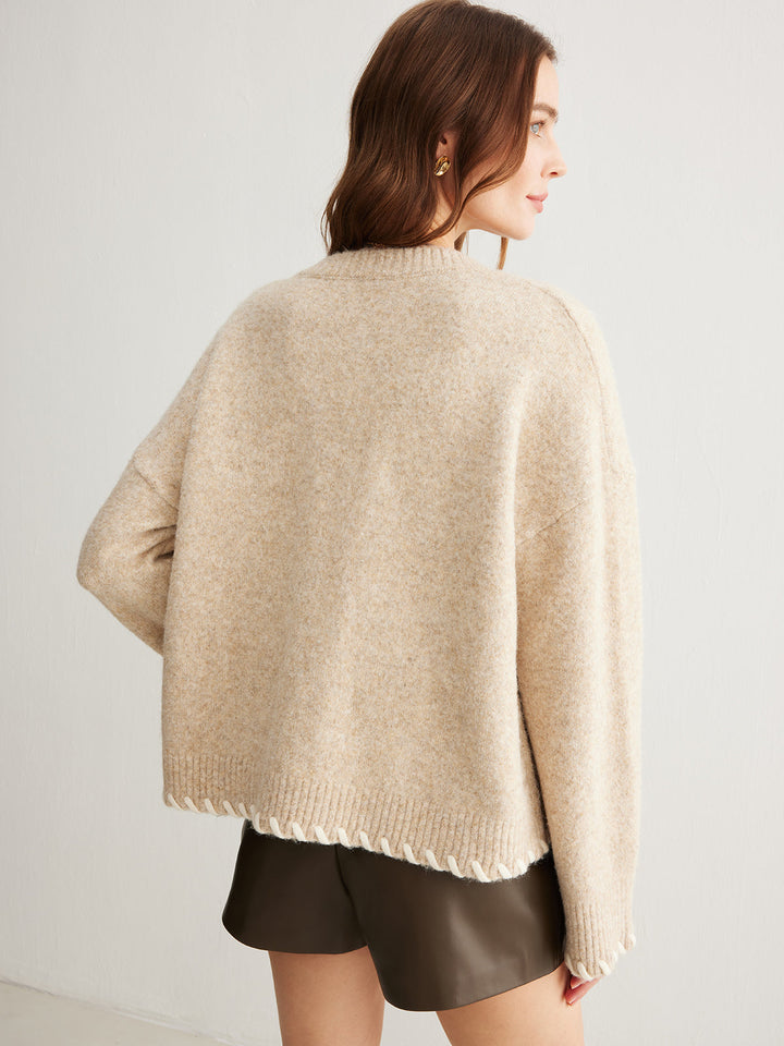 Pull en maille avec bordure brodée