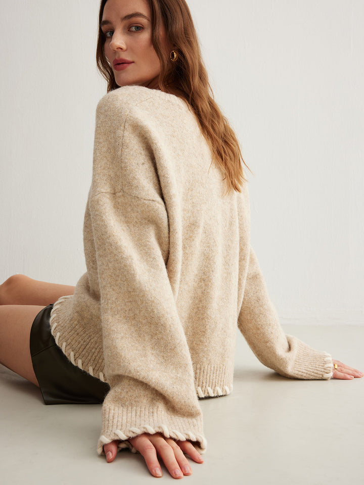 Pull en maille avec bordure brodée