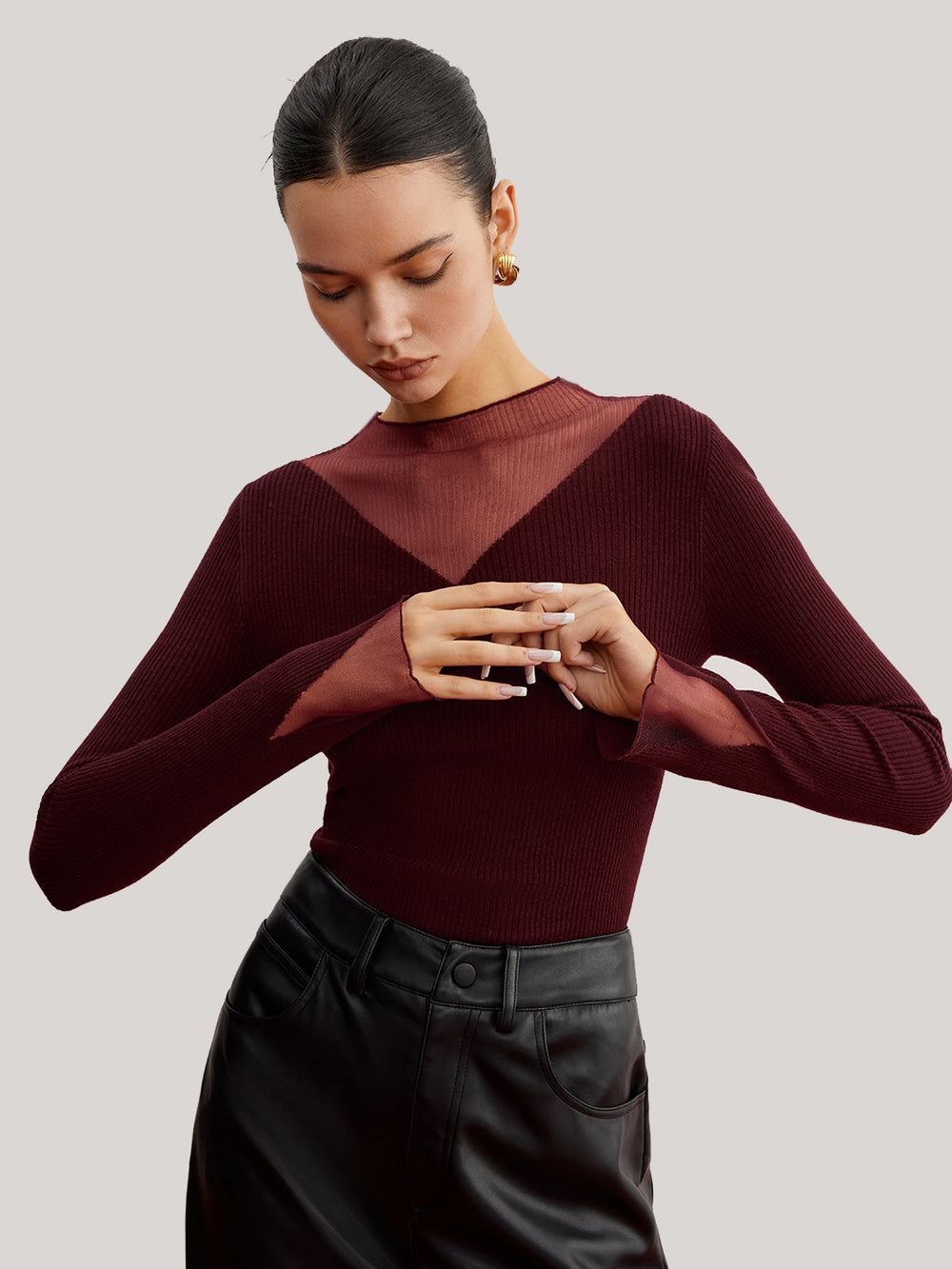 Pull en maille côtelée transparente minimaliste