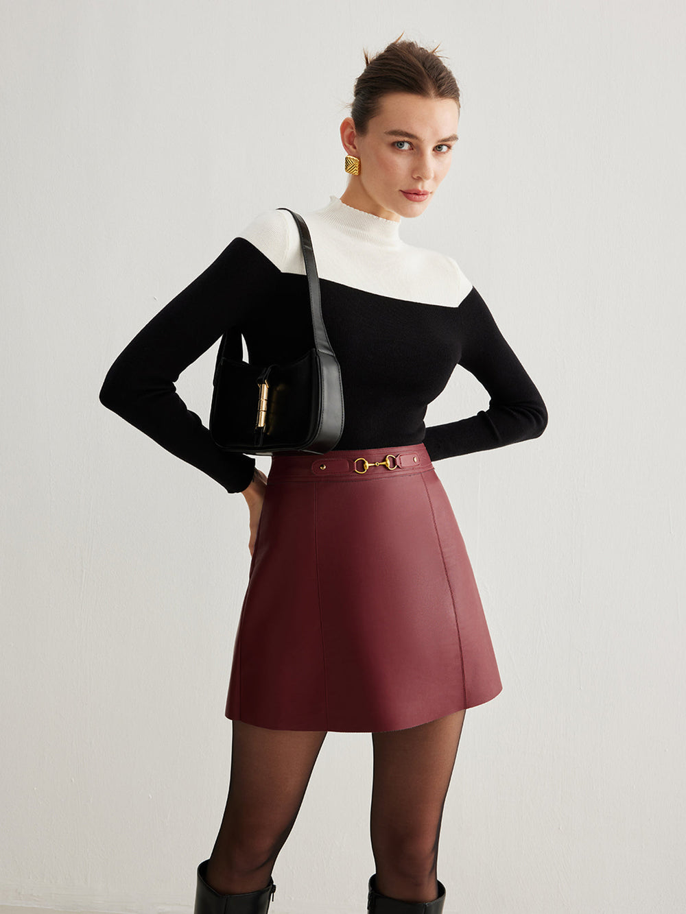 Jupe en cuir synthétique à fermeture magnétique