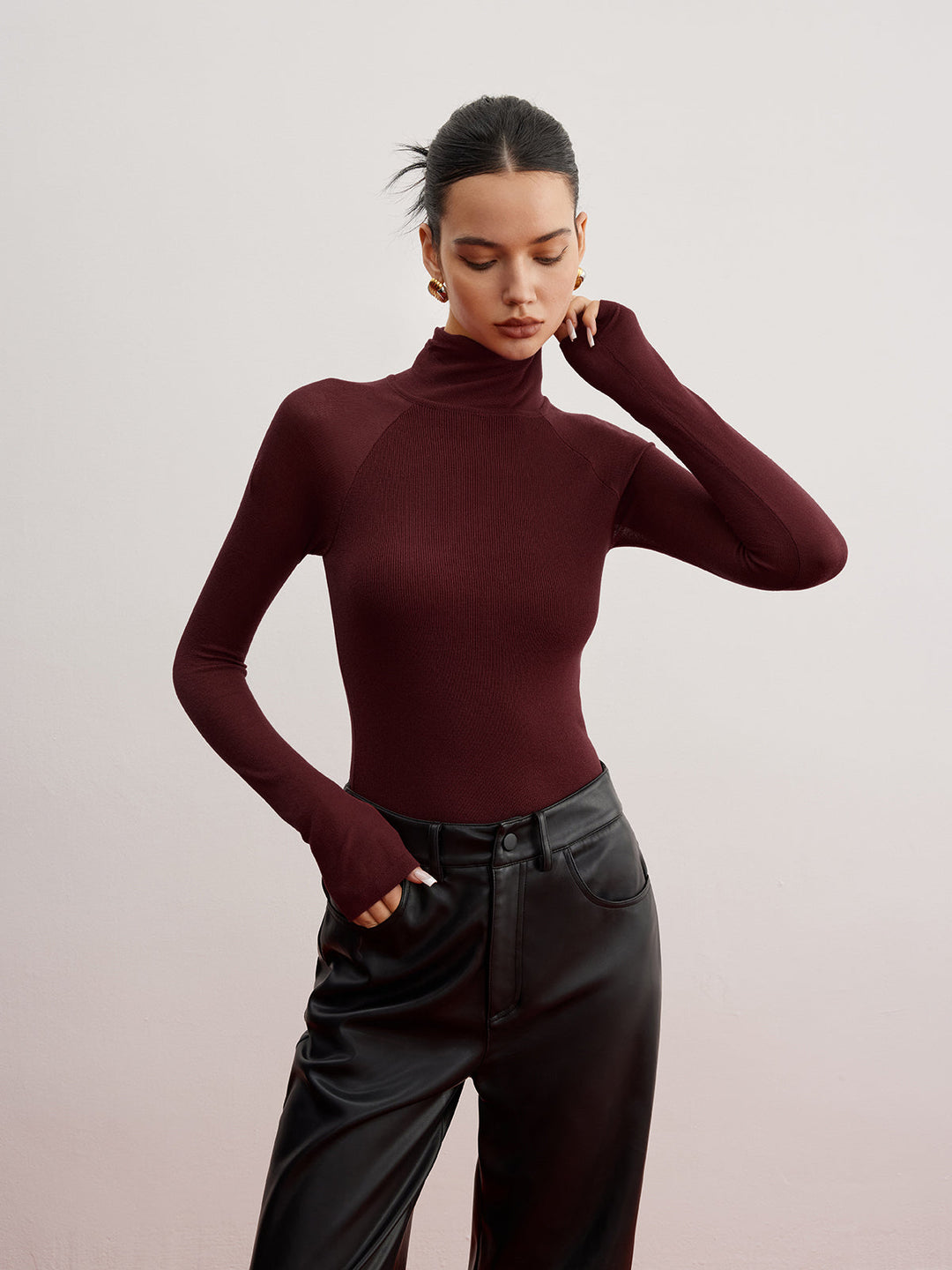 Pull ajusté à manches transparentes