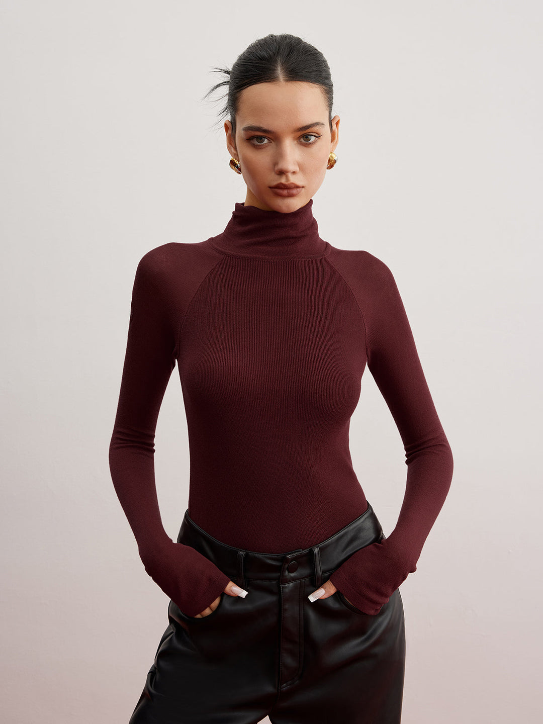 Pull ajusté à manches transparentes