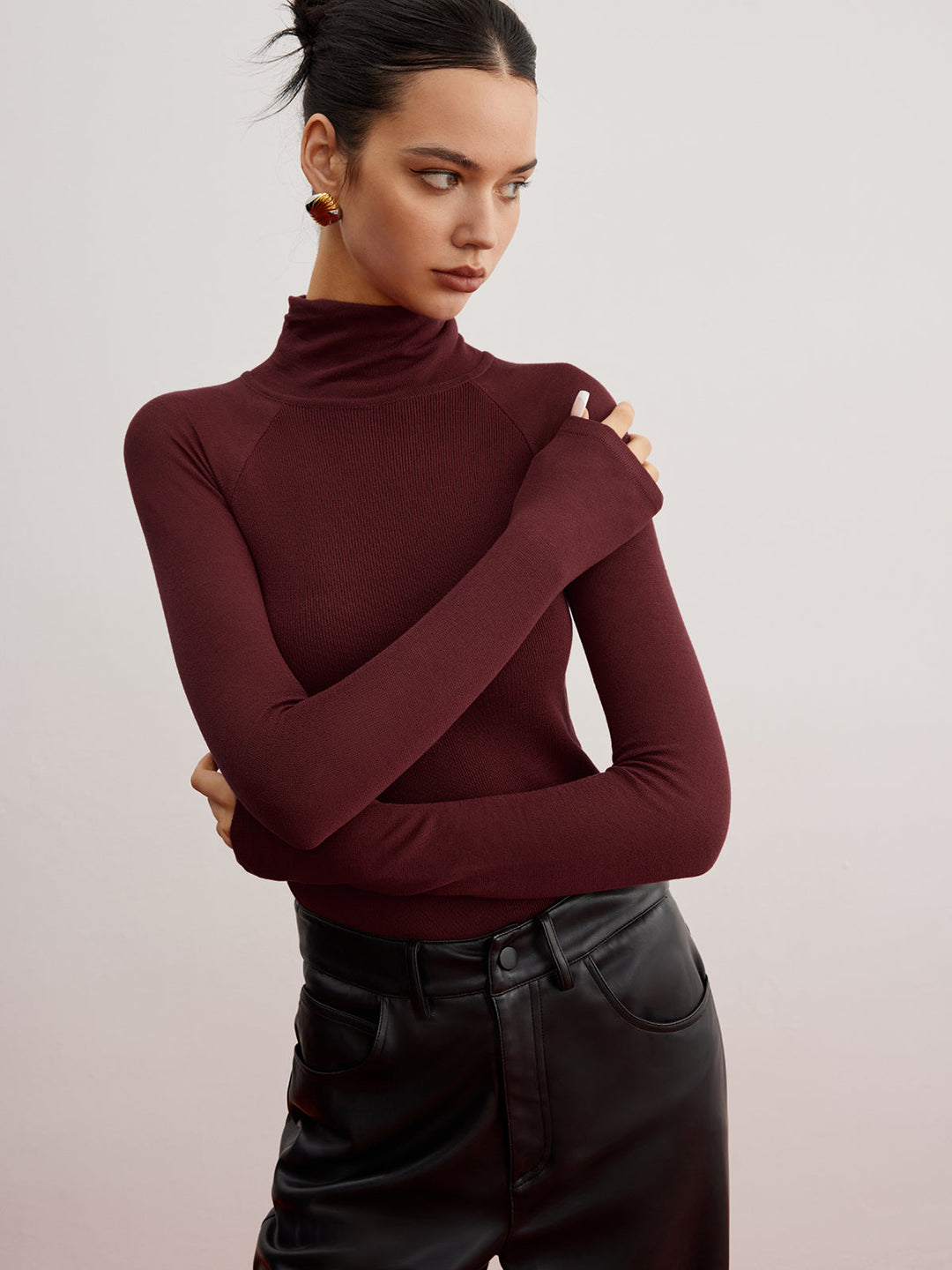 Pull ajusté à manches transparentes